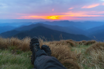 The legs on the beautiful mountain landscape background