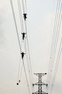 Electrician Worker Of Metropolitan Electricity Authority Working Repair Electrical System On Electricity Pillar Or Utility Pole