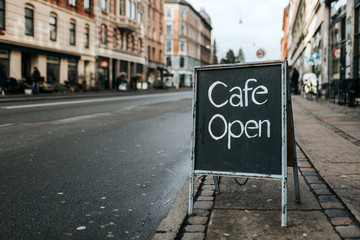 Open"" sign outside a cafe