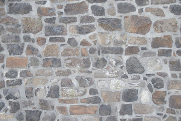 Polygone Mauer aus Natursteinen Hintergrund