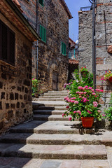 Fototapeta na wymiar Medieval Italian streets and houses in Abbadia San Salvatore