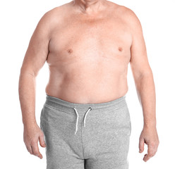Naklejka premium Fat senior man on white background, closeup. Weight loss