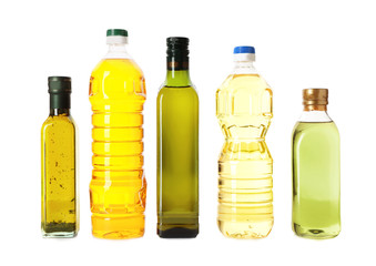 Naklejka premium Bottles with different oils on white background