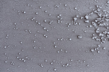 snowy abstract pattern of ice crystals on the surface