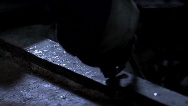 Worker&rsquo;s Hand Draws A Long Ladle