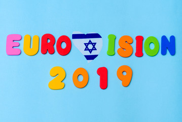 Text : Eurovision 2019 with flag Israel Magen David Star heart shape on blue background. Eurovision Song Contest May 2019 In Tel Aviv.