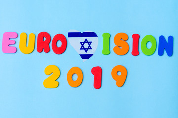 Text : Eurovision 2019 with flag Israel Magen David Star heat shape on blue background. Eurovision Song Contest May 2019 In Tel Aviv.