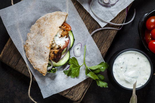 Pita Bread Filled With Vegetables And Chicken Gyros