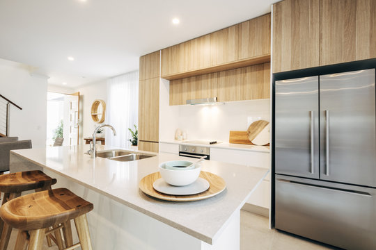 Open plan kitchen and living room inside modern home