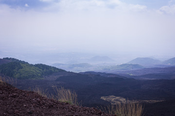 View from the Silvestri Craters on Mount Etna, active volcano on the east coast of Sicily, Italy,...