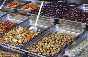 Green and black olives in the fruit market, Catania, Sicily, Italy