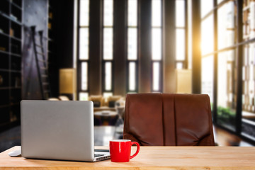workspace with laptop, laptop, office supplies, and coffee cup, smartphone, and tablet at office. desk work concept. in morning light