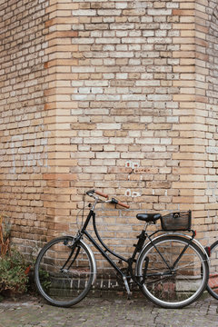 Bicycle against brick wall