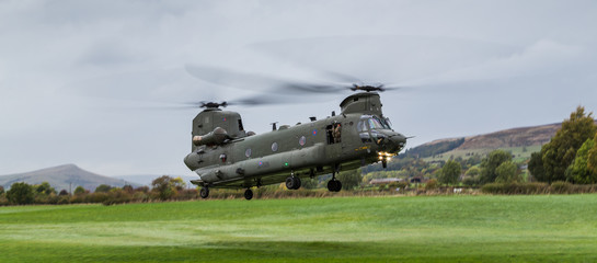 Wide angle image of an Royal Air Force CH-47-HC.6A Chinook helicopter as it returns to base after a...