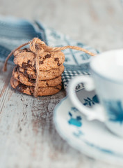 cookies and cup of coffee on wooden table