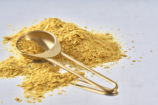Nutrional Yeast, Used in Vegan and Dairy-Free Cooking as a replacement for cheese/dairy flavor.