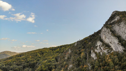 Fototapeta na wymiar view of mountains in national park Cheile Nerei Beusnita in Romania. Part of Carpathian mountains with beautiful autumn colors.