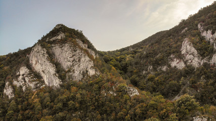 Fototapeta na wymiar view of mountains in national park Cheile Nerei Beusnita in Romania. Part of Carpathian mountains with beautiful autumn colors.