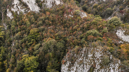 view of mountains in national park Cheile Nerei Beusnita in Romania. Part of Carpathian mountains with beautiful autumn colors.