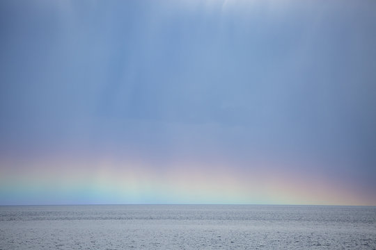Rainbow over ocean