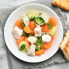 Soup from carrot, potato, broccoli and chicken breast