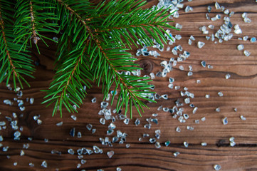 Happy new year and Merry Christmas concept. Christmas tree with new year decoration and bokeh on the wooden background.