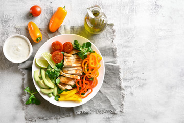 Vegetable salad with roasted chicken breast