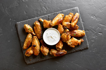 Grilled chicken wings with sauce