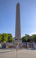 Obelisk of Theodosius or Egyptian Obelisk in ancient Hippodrome near Sultanahmet,Blue Mosque in...