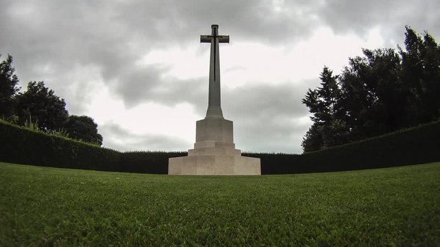 Cross monument and clouds.