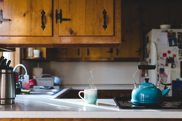 Steaming coffee on the kitchen counter