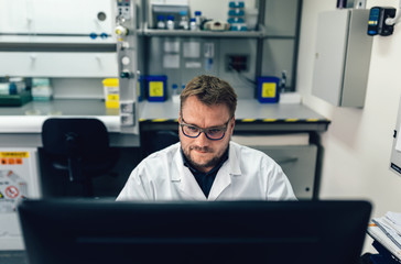 Biologist Working on computer in the Laboratory office