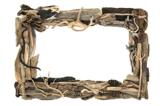 Rustic driftwood frame forming a background border on white with copy space.