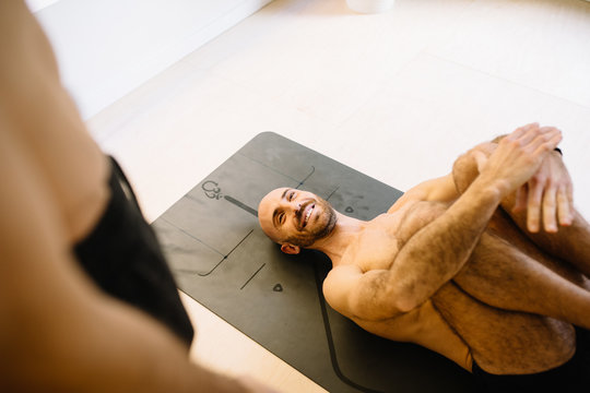 Laughing man training with partner