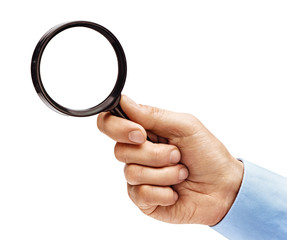 Man's hand in shirt holding magnifying glass isolated on white background. Close up. High resolution product