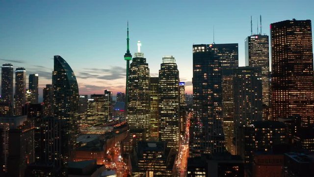 dusk flying right view of Toronto skyline