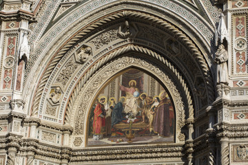 Fototapeta premium Beautiful details above the doors of Florence cathedral