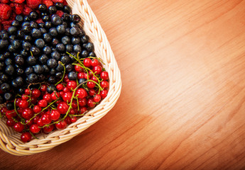 Mix of different berries in basket