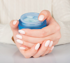 female hands with cream