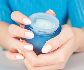 female hands with cream