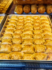 Baklava, a traditional Arab dessert made with layers of Filo, a very thin unleavened dough and stuffing with nuts.