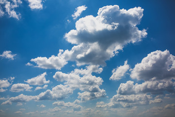 Beautiful white clouds in the blue sky. Amazing summer view.