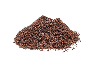 Heap of ground coffee on white.