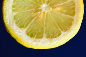 Macro details of yellow Lemon slices in black background