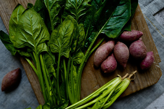 Freshly picked organic spinach and sweet potatoes
