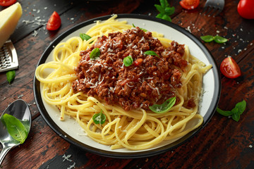 Italian pasta bolognese with beef, basil and parmesan cheese