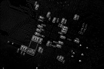 Computer motherboard. Tracks on the printed circuit board. Electronic components. Resistor, transistor, parts, soldering, processor chips, firmware, programming, chip.
