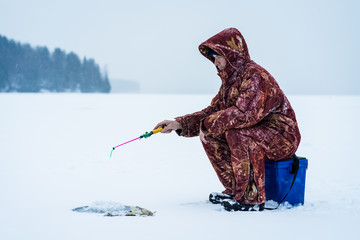 Winter Ice Fishing on the River
