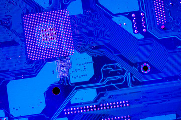 Computer motherboard. Tracks on the printed circuit board. Electronic components. Resistor, transistor, parts, soldering, processor chips, firmware, programming, chip.