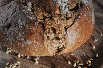 still life on the subject of bread, grain, milk.